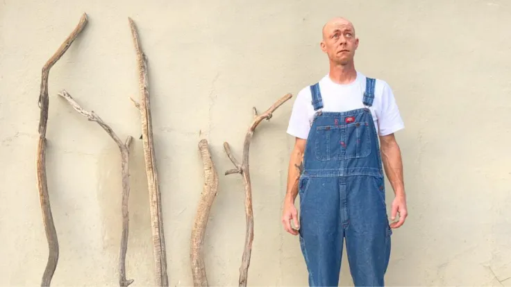 Marc Johnson in overalls